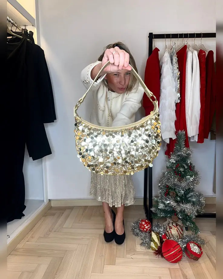borsa in paillettes oro adatta per una serata elegante durante il periodo di natale insieme alla famiglia o tra amiche