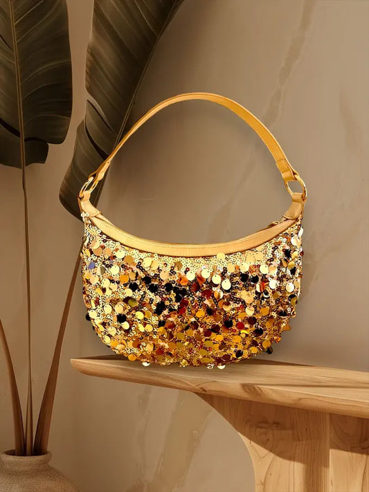 borsa a mano con paillettes in oro