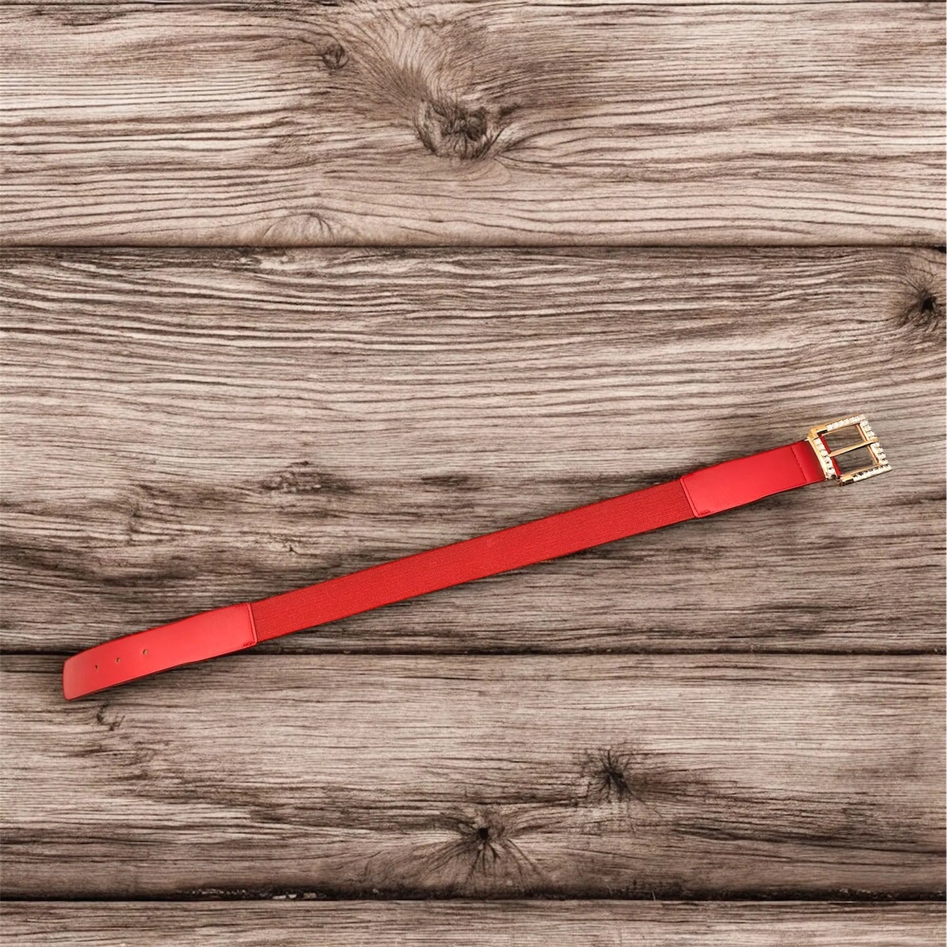 cintura elasticizzata con fibbia dalla forma quadrata in oro