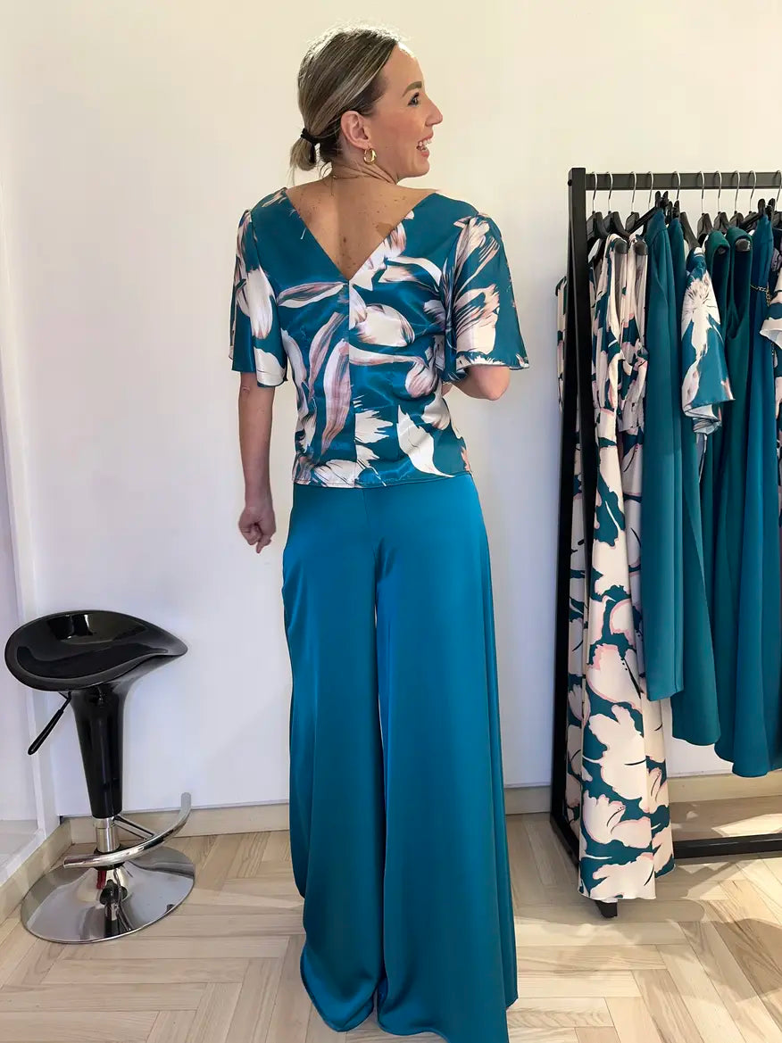 pantalone a palazzo con catena elegante