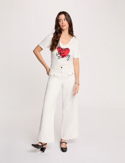 t-shirt a maniche corte con il dettaglio cuore frontale e scritta love story, 100% cotone, collezione primavera/estate 2026 firenze